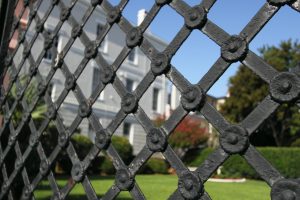 Section of fence linked to electric gates