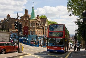 An image of a bus travelling through Haringey, one of the London areas serviced by London Electricians