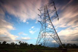 Image of a telephone pylon with multiple wires coming out of it